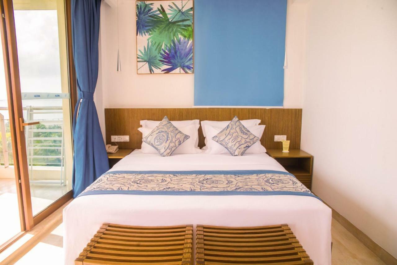 Aloha Oceanfront Suite Resort Lingshui (Hainan) Room photo